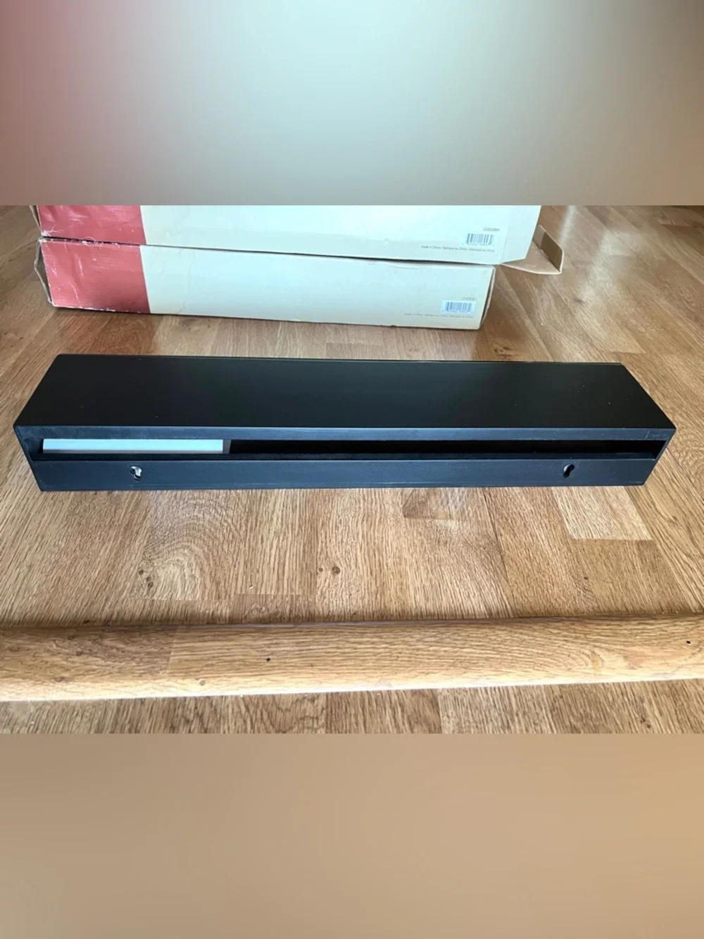 Modern Black Wall Display Shelf with Mirrored Front